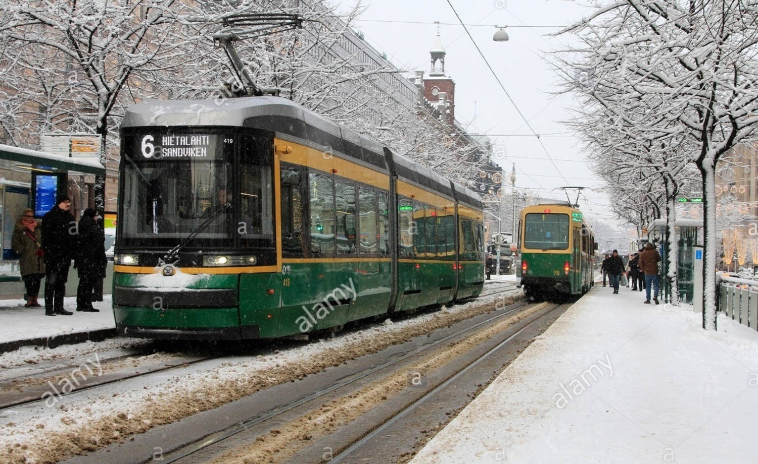 Tram stop in Helsinki. Photo: Helsinki People Winter Stock Photos and Images https://www.alamy.com/stock-photo/helsinki-people-winter.html