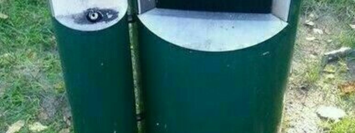 A sufficient number of neat bins with room for cigarette butts